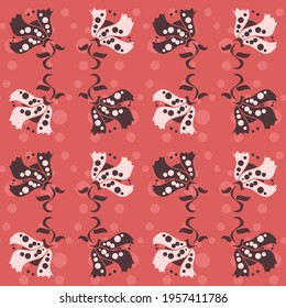 Cute, seamless floral repeat pattern in a symmetrical formation in brown and cream on a salmon pink polka dot background