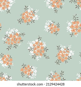 cute seamless floral vector small flowers leaves bunches pattern on green background