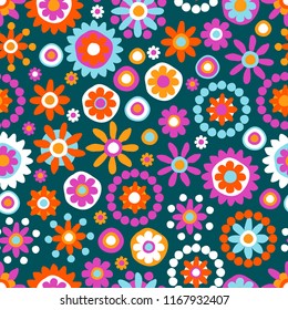Cute seamless hand-drawn pattern with flowers and dots. Retro vector floral background.