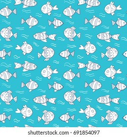 Cute seamless ocean themed pattern with hand drawn fish on blue background