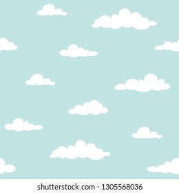 Cute seamless ornament with white clouds on powder blue background. Overcast pattern. Vector illustration. Cartoon weather wallpaper. Funny nature  backdrop.