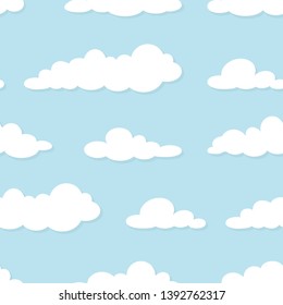 Cute seamless ornament with white clouds on powder blue background. Overcast pattern. Vector illustration. Cartoon weather wallpaper. Funny nature  backdrop.