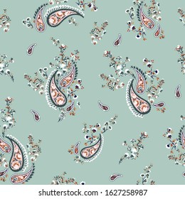 cute seamless paisley pattern on green background