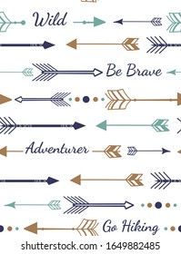 Cute seamless pattern with arrows and lettering wild, adventurer, be brave, go hiking. Pattern for scrap-booking, greeting cards, gift wrap, wallpapers, baby textiles or surface textures.