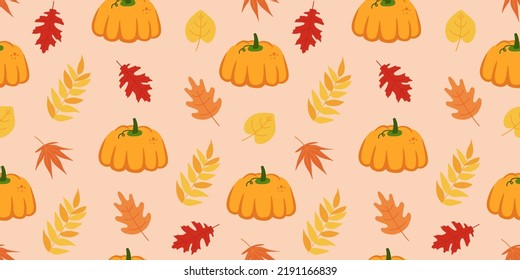 Cute seamless pattern with autumn leaves, pumpkins