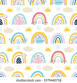 Cute Seamless Pattern With Baby Rainbows, Clouds, Sun, Rain. Stylized Child's Drawing. Design For Scrapbooking, Fabrics For Baby Clothes And Bedding. Vector Illustration Drawn By Hands