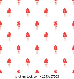 Cute seamless pattern background with cartoon amanita mushrooms. 