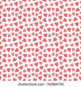 Cute seamless pattern background with hand drawn, doodle red and pink hearts.
