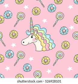 Cute seamless pattern with candy, stars, donuts and unicorn on a pink background.