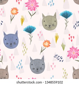 Cute seamless pattern with cartoon colorful cats heads, pink hearts and childish flowers. Funny hand drawn domestic cat texture for kids design, wallpaper, textile, wrapping paper