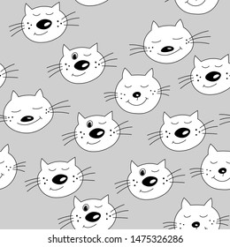Cute seamless pattern with cat faces. Doodle style. Cats on grey background.  Colouring page for adults and kids. Collection isolated funny kitten with different emotion in cartoon style.