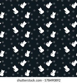 Cute seamless pattern with cats, paw prints