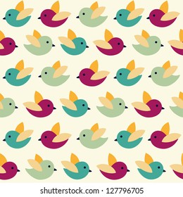 Cute seamless pattern with color birds. Vector illustration