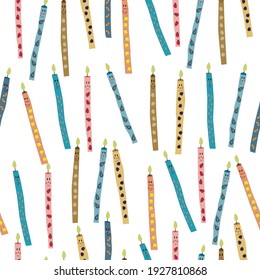 Cute seamless pattern from colorful candles of bright design. Vector illustration on white background. 