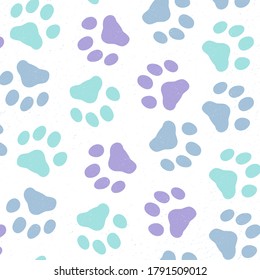 Cute seamless pattern with colorful  doodle paw prints. Animal background