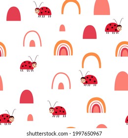 Cute seamless pattern with colorful rainbows, ladybugs and a flat Scandinavian doodle style. Vector illustration for a children s brand, fabric design, postcard, poster. Decoration of children room
