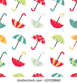Cute seamless pattern with colorful umbrellas. Vector illustration on white background.