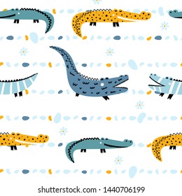 Cute seamless pattern with crocodiles. Vector children's illustration with crocodiles and colored stones on a white isolated background. Printing on fabric, clothing, textiles, packaging paper.