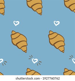 Cute seamless pattern with delicious croissants