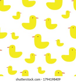 Cute seamless pattern design with yellow ducks on white background. Perfect for baby fabric, textile, kids fashion. Surface pattern design.
