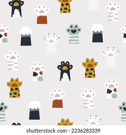 Cute seamless pattern with different cat paws. Childish print. Vector hand drawn illustration.