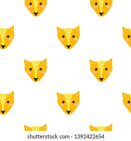 Cute seamless pattern with doodle orange fox faces.