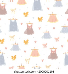 Cute seamless pattern with dresses and skirts. Pattern for girls princesses