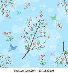Cute seamless pattern with flowering branch, silhouettes of birds and clouds