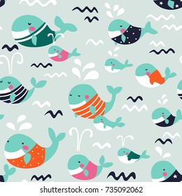 Cute seamless pattern with funny whales in pastel colors 