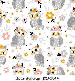 Cute seamless pattern with gray owls and flowers in cartoon style. Creative vector childish background for fabric, textile or wrapping paper.