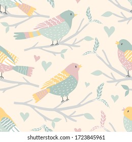 cute seamless pattern with green and pink birds on branches on a beige background