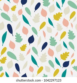 Cute seamless pattern with hand drawn leaves. Vector illustration background. Trendy colors
