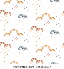 Cute seamless pattern with hand drawn rainy clouds. Design texture for kids. Childish vector illustration.