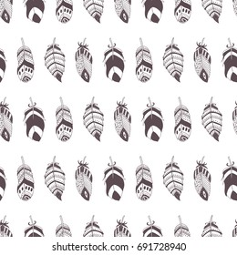 Cute seamless pattern with hand drawn set of different feathers. Bird feather collection in doodle style. Vector illustration
