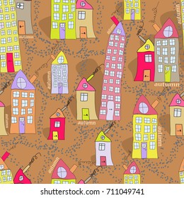 Cute seamless pattern of hand drawn houses in autumn town