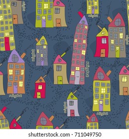 Cute seamless pattern of hand drawn houses in night town