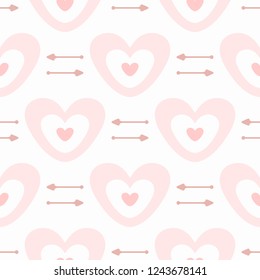 Cute seamless pattern with hearts and arrows. Romantic print. Girly vector illustration.