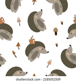 Cute seamless pattern with hedgehog, mushrooms and apples. Hand drawn vector illustration for your design.