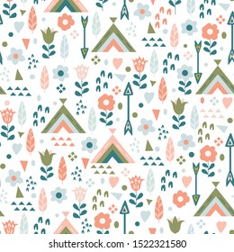 Cute seamless pattern for kids, vector. Texture with cute graphic elements: flowers, wigwams, arrows and feathers. Vector illustration in pastel colors