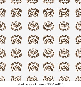 Cute seamless pattern with little cartoon owls. Stylish graphic design.