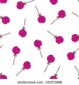 Cute seamless pattern made of pink lolly pop candies.