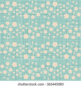 Cute seamless pattern with many repeating spring cherry flowers, on the blue canvas background. Vector illustration  eps