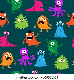 Cute seamless pattern with a monsters on a green background