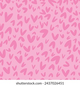 Cute seamless pattern with pink hearts. 