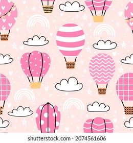 Cute seamless pattern with pink hot air balloons in sky. Childish print with clouds and rainbows. Cartoon dream adventure vector wallpaper. Romantic vehicle with basket flying or floating