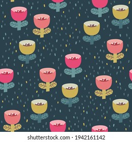 Cute seamless pattern with pink and mustard tiny flowers on the navy blue polka dots background. Vector doodle flowers. Fun pattern for fabric and clothes.