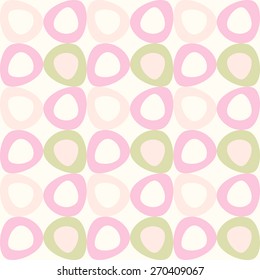 Cute seamless pattern with pink and olive ovals.