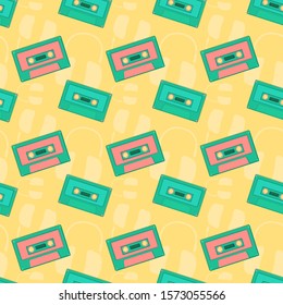 Cute seamless pattern with pink and turquoise audio cassettes and headphones silhouettes on yellow background