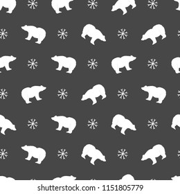 Cute seamless pattern with polar bears and snowflakes. Winter hand drawn design. Vector print.