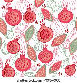 Cute seamless pattern with pomegranates and leaves on a white background.